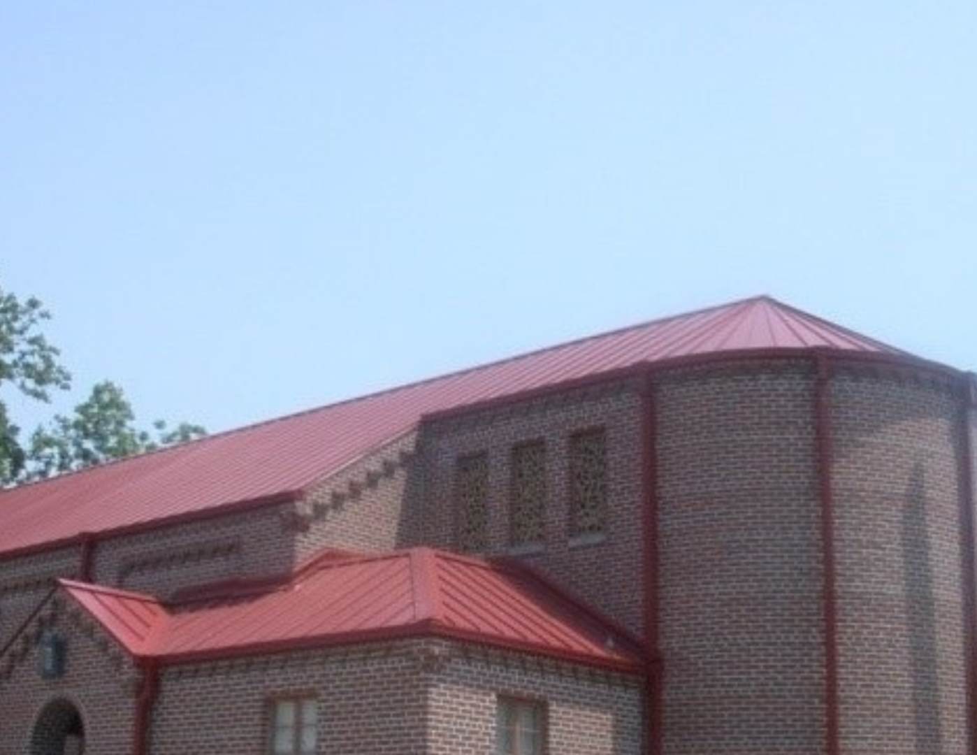 A building with red roof and windows