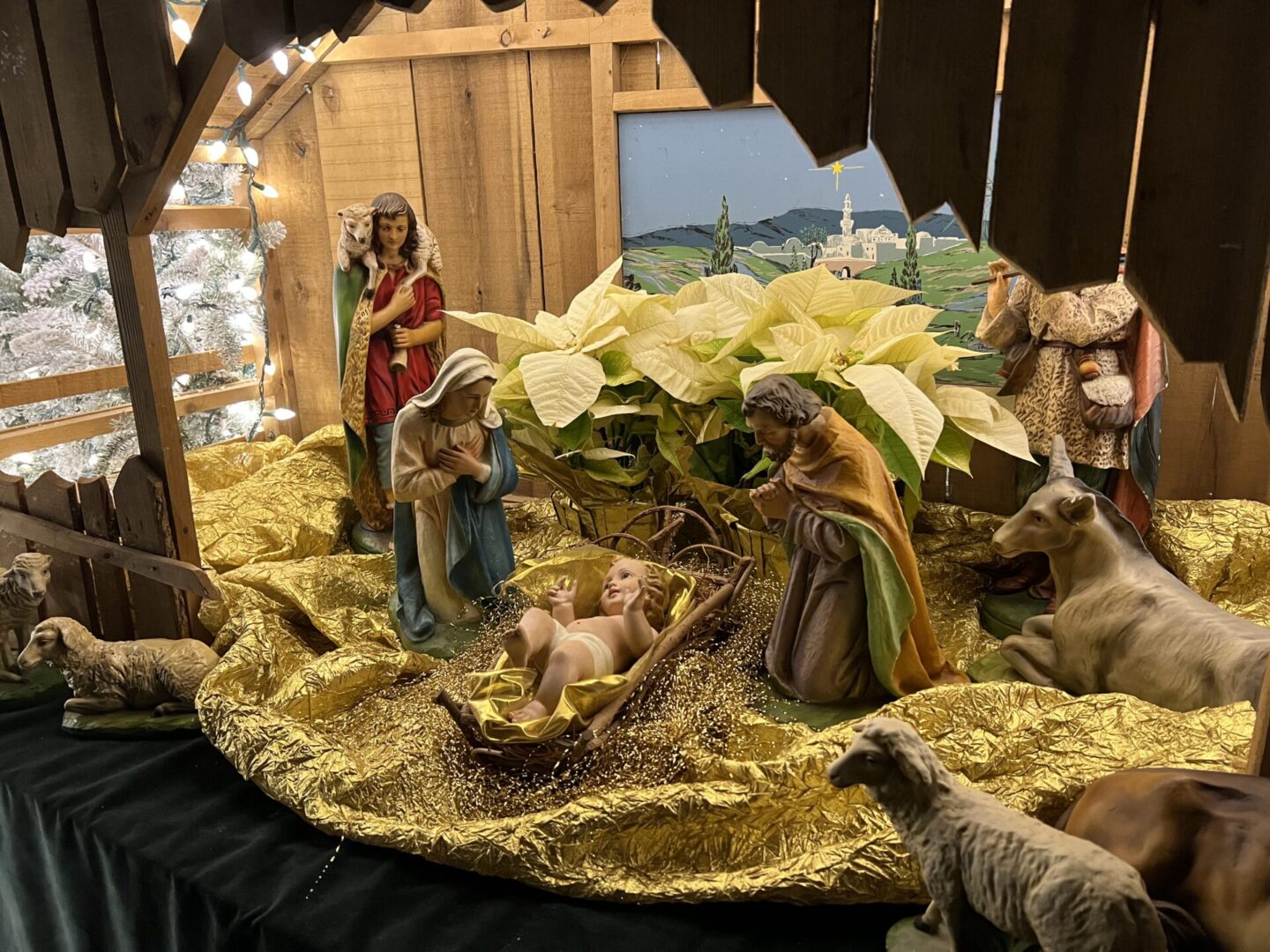A nativity scene with the baby jesus in a manger.